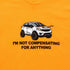 I'm Not Compensating Orange Tee - Danny Duncan